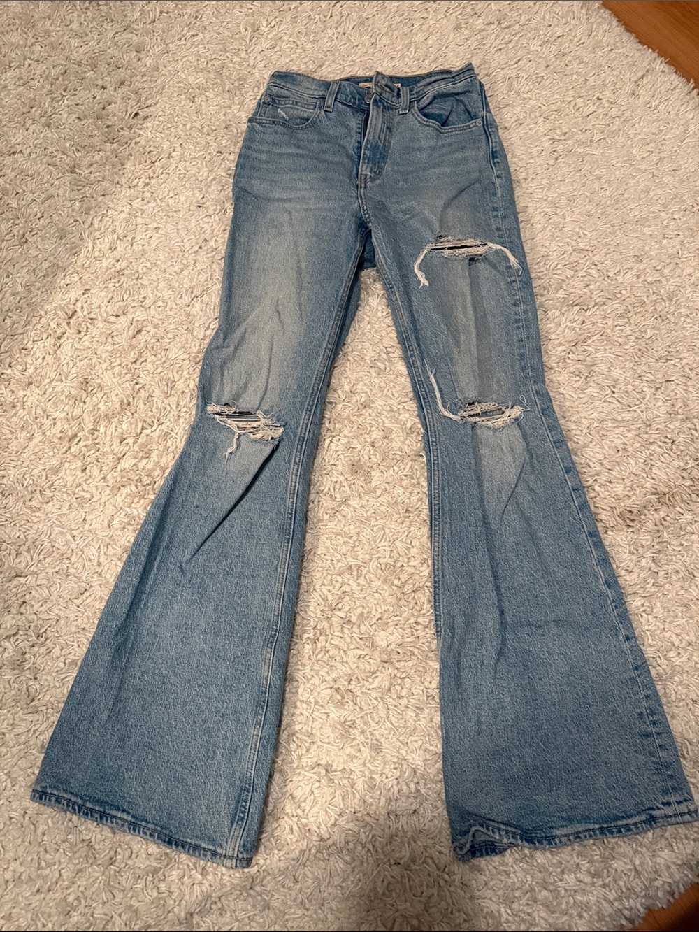 Levi’s Ripped High-Rise Flare Jeans in Light Blue
